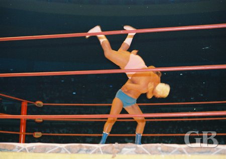 Rene Goulet body slams a pink Ripper Collins