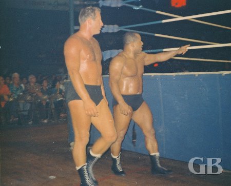 Nick Bockwinkel and Luther Lindsay approach the ring.