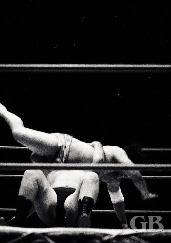 Peter Maivia attempts to cover a surprised Curtis Iaukea.
