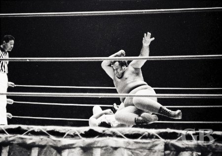 Curtis Iaukea delivers the flying elbow drop onto Jim Hady.