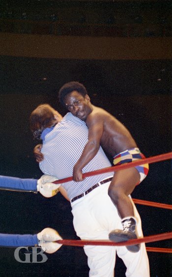 Bobo Johnson clinging to the referee