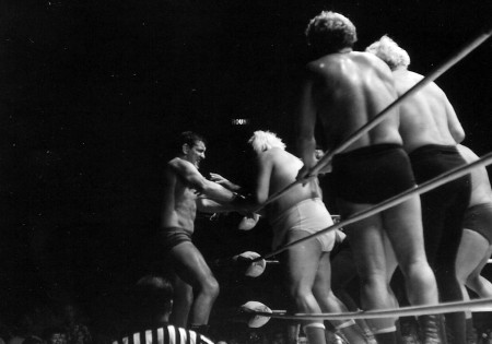 Wrestlers surround Billy Robinson from re-entering the ring