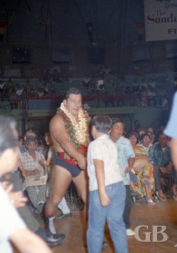 Jim Hady greets fans on the way to the ring.