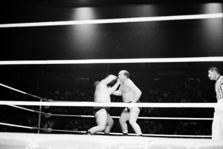 Hady and Kox battle it out in the middle of the ring referee Wally Tsutsumi watches.