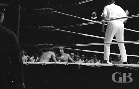 Johnny Barend and Dutch Schultz are counted out of the ring.