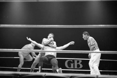Jim Hady puts the Sleeper Hold on Dutch Schultz as Ripper Collins attempts a rescue.