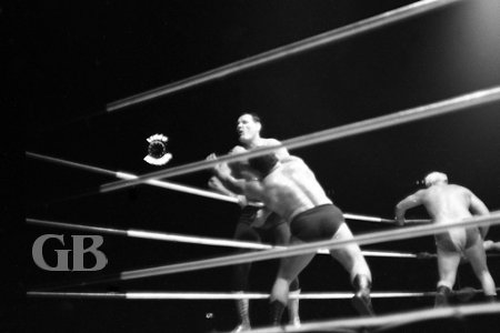 Jim Hady sucker punches Kowalski as the Killer stands outside the ring.